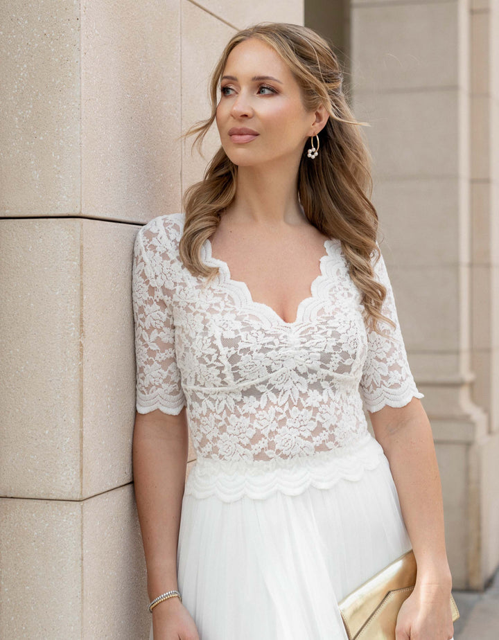 andcompliments_online_shop_brautmode_tulle_skirt_tuellrock_tuell_braut_hochzeit_online_shoppen_crop_top_langarm_spitze_oberteil_braut-weißes kleid_brautkleid