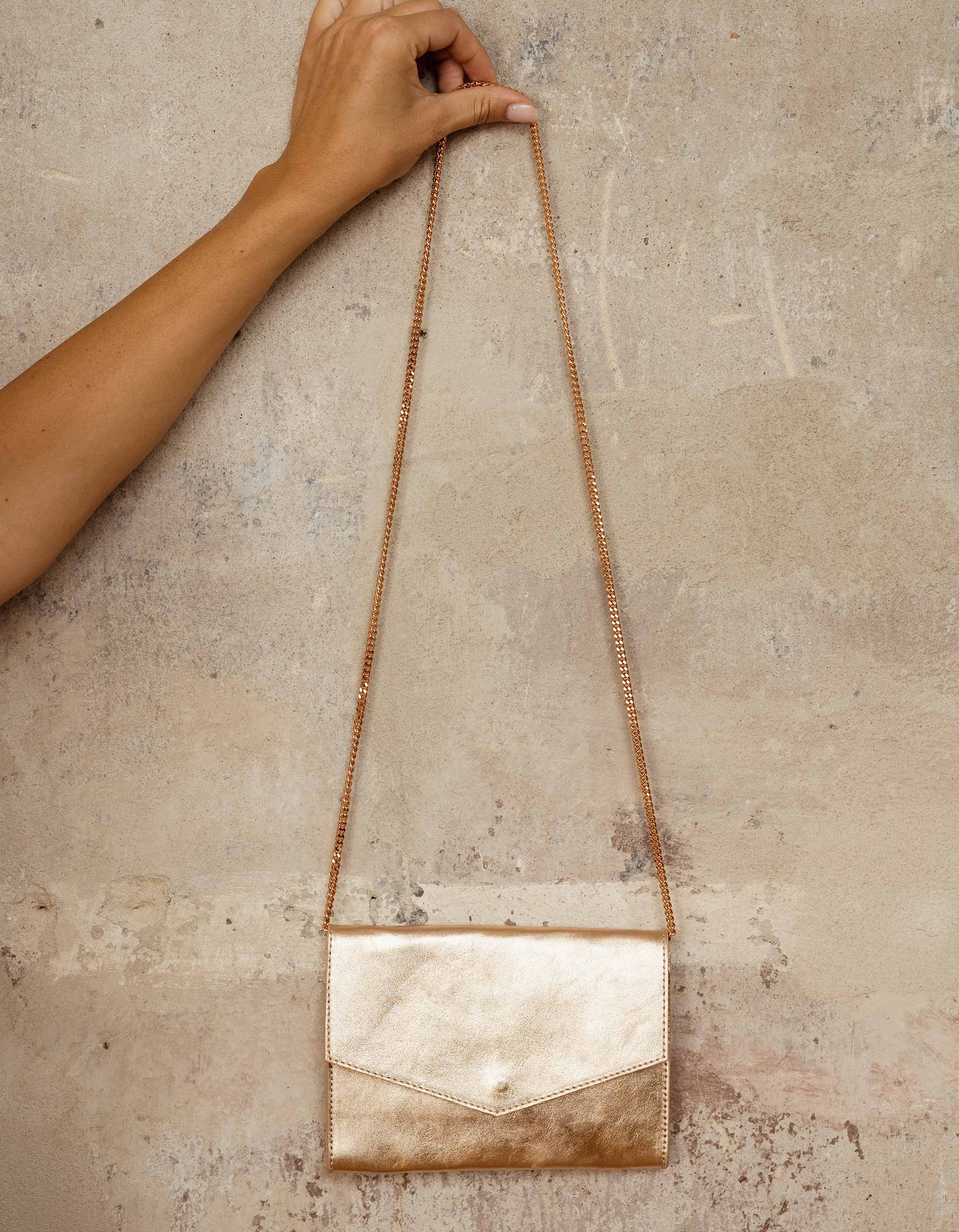 Large rose gold best sale clutch bag